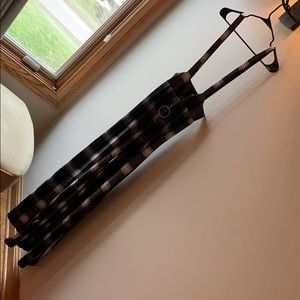 Akira pants romper over all. Slit sides